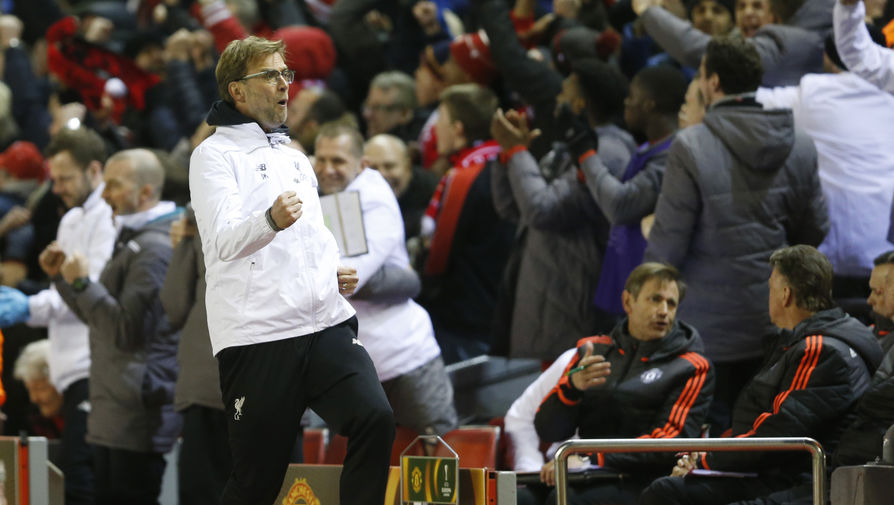 Football Soccer &mdash; Liverpool v Manchester United &mdash; UEFA Europa League Round of 16&nbsp;First Leg &mdash; Anfield, Liverpool, England &mdash; 10/3/16
Liverpool manager Juergen Klopp celebrates after Roberto Firmino scored their second goal as Manchester United's Louis van Gaal (R) looks on
Action Images via Reuters / Carl Recine
Livepic
EDITORIAL USE ONLY.