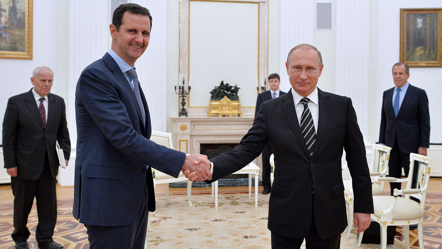 Президент Сирии Башар Асад и президент РФ Владимир Путин во время встречи в Кремле