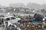 Последствия разрушительного цунами на северо-востоке Японии. 2011 год