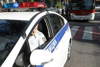 Полицейский автомобиль на одной из улиц в Донецке, 19 сентября 2017 года