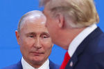 Президент России Владимир Путин и президент США Дональд Трамп на саммите G20, 30 ноября 2018 года