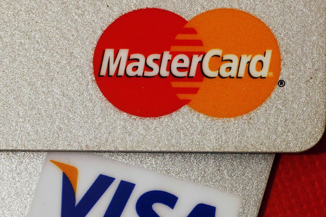 Visa и MasterCard согласились выплатить ритейлерам $6 млрд