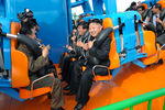 Ким Чен Ын на одном из аттракционов в Пхеньяне, 2013 год