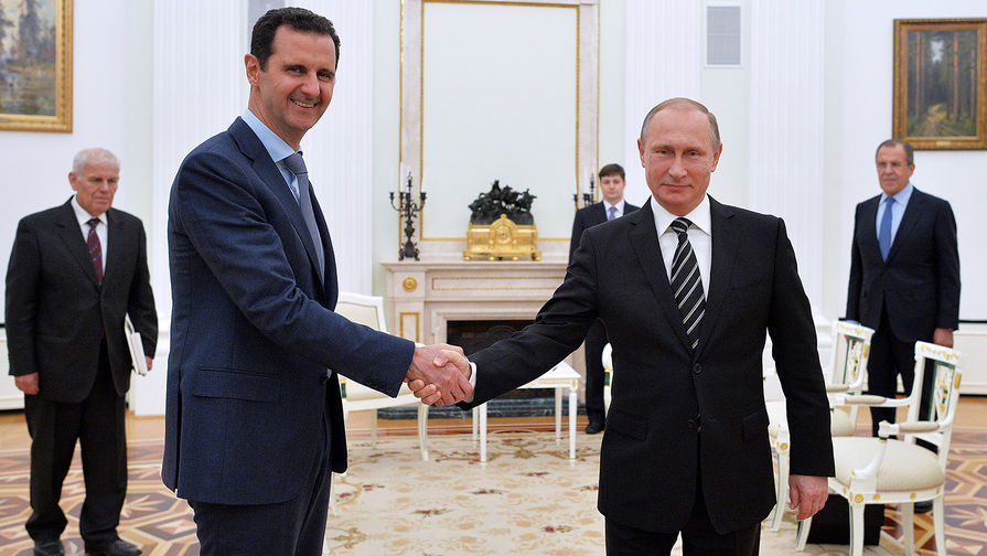 Президент Сирии Башар Асад и президент России Владимир Путин во время встречи в Кремле