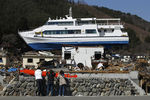 Последствия разрушительного цунами на северо-востоке Японии. 2011 год