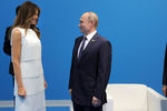 Первая леди США Меланья Трамп и президент России Владимир Путин, 7 июля 2017 года