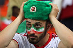 Болельщик сборной Ирана после матча группового этапа чемпионата мира по футболу между сборными Ирана и Португалии