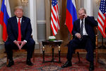 Президент США Дональд Трамп и президент России Владимир Путин во время встречи в Хельсинки, 16 июля 2018 года