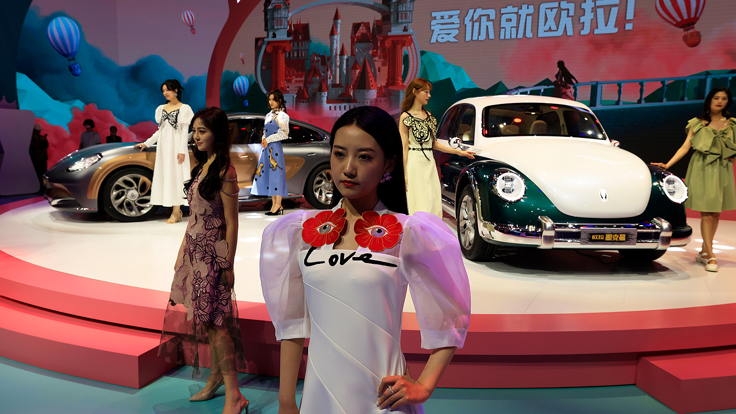 Модели на стенде автобренда Ora (бренд, принадлежащий компании Great Wall Motors) на Шанхайском автосалоне, апрель 2021 года