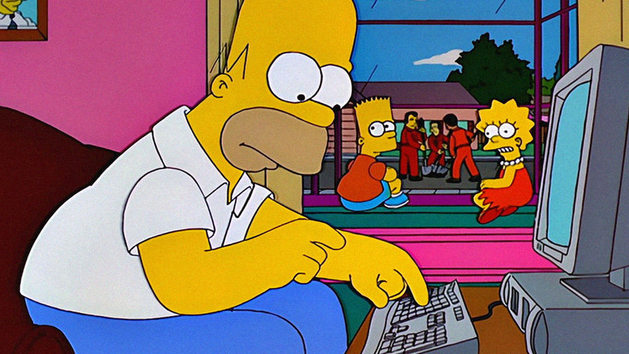 Гомер Симпсон из мультсериала «Симпсоны» за компьютером