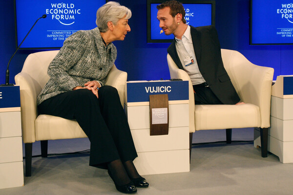Директор-распорядитель МВФ Кристин Лагард и Ник Вуйчич на&nbsp;Всемирном экономическом форуме в&nbsp;Давосе, 30&nbsp;января 2011&nbsp;года