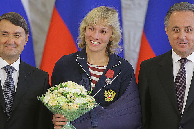 Помощник президента РФ Игорь Левитин, бронзовый призер Олимпиады-2016 по боксу среди женщин в весовой категории до 60 кг Анастасия Белякова и министр спорта Виталий Мутко