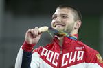 Давит Чакветадзе с золотой олимпийской медалью