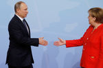 Президент России Владимир Путин и канцлер Германии Ангела Меркель 