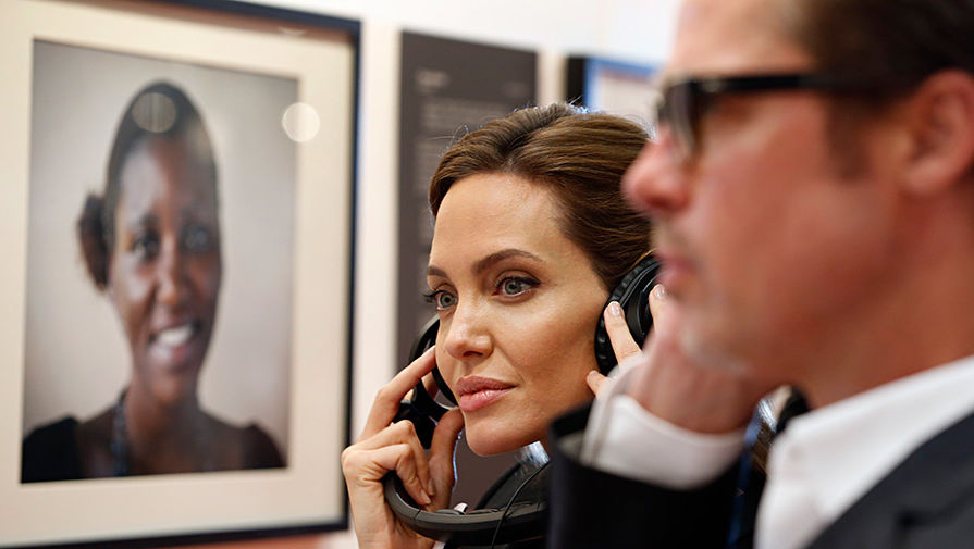 Брэд Питт и Анджелина Джоли на саммите в Лондоне, 2014 год