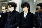 Группа The Cure и барабанщик Энди Андерсон (на фото справа)