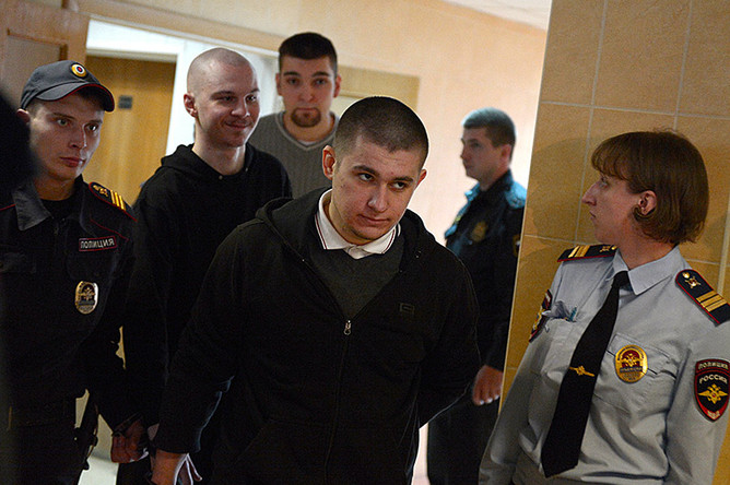 Обвиняемый в организации беспорядков на Болотной площади Алексей Полихович (на первом плане)