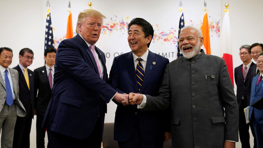 Президент США Дональд Трамп, премьер-министр Японии Синдзо Абэ и премьер-министр Индии Нарендра Моди на полях саммита G20 в Осаке, 28 июня 2019 года 