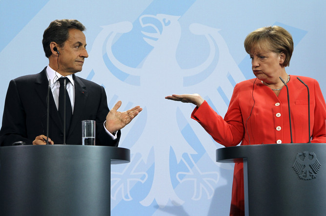 Саркози провел экстренные переговоры с Меркель