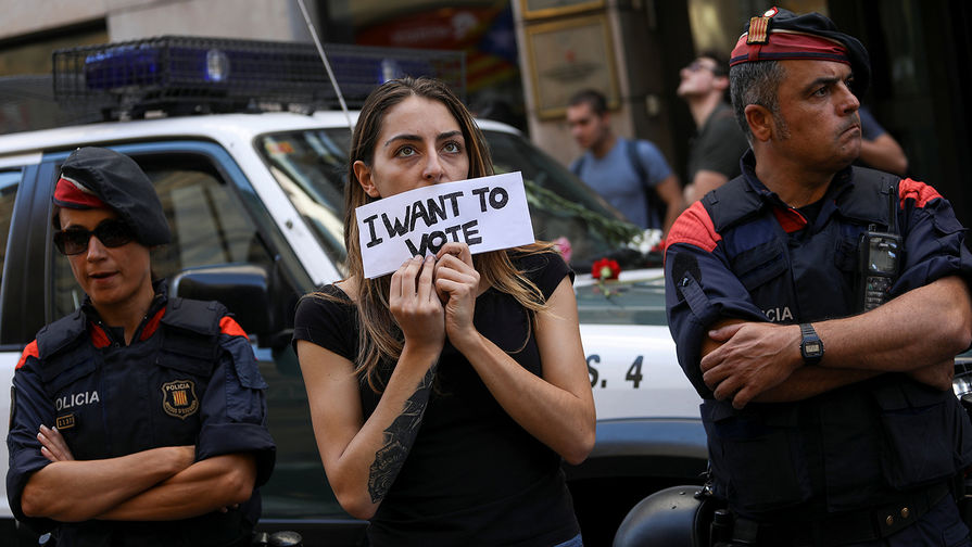 Во время митинга в центре Барселоны, 20 сентября 2017 года