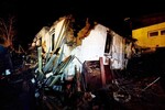 Дом, разрушенный в результате падения самолета Су-30 в Иркутске, 23 октября 2022 года