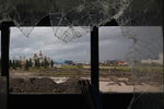 Вид на олимпийские объекты из окна заброшенного автобуса в Адлере