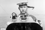 Сигнальщик пограничного катера Черноморского флота на боевом посту. 1973 год