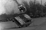 A stuntman jumps over a burning ring on the roof of a moving Moskvich car, 1988