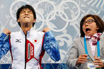 Юдзуру Ханю и его тренер Ёсико Кобаяси после исполнения короткой программы на Олимпийских играх 2014 года в Сочи