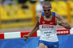  Российский спортсмен Ильгизар Сафиуллин, завоевавший первое место в соревнованиях по бегу с препятствием на 3000 м