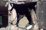 Развалины дома в Грозном после штурма города отрядами чеченских боевиков