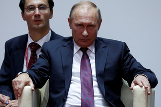 Президент России Владимир Путин во время посещения соревнований Международного турнира по дзюдо имени Дзигоро Кано во Владивостоке, 7 сентября 2017 года