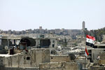 Вид на один из районов Алеппо, подконтрольных правительственным войскам Сирии