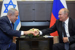 Президент России Владимир Путин и премьер-министр Израиля Биньямин Нетаньяху во время встречи в Сочи, 12 сентября 2019 года