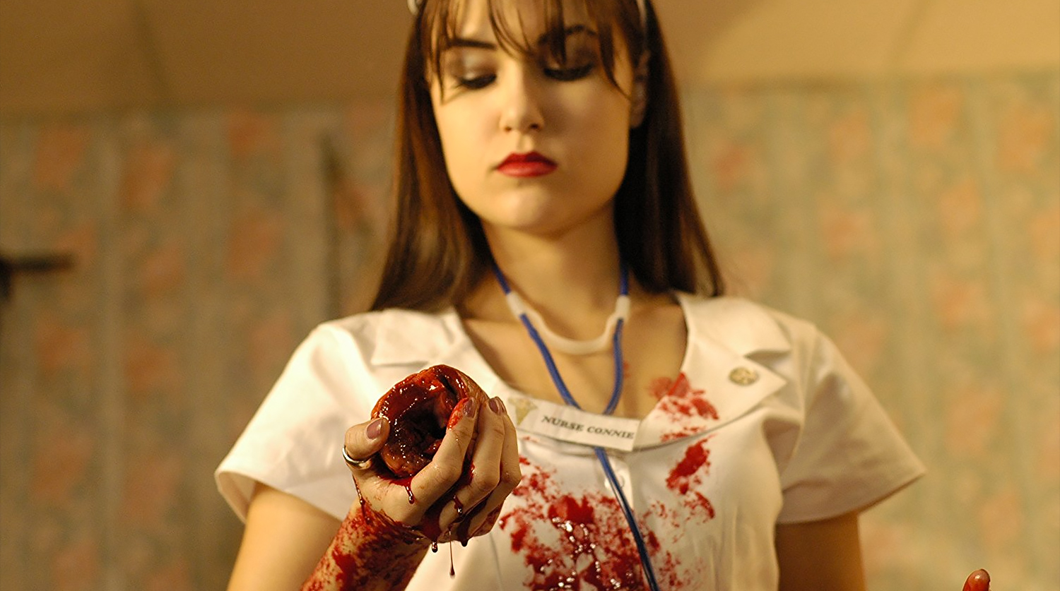 Саша Грей в сцене из фильма "Кровавый монтаж" (2009) .