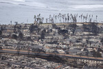 Вид на город Лахайна, почти полностью уничтоженный лесными пожарами, Гавайские острова, 10 августа 2023 года
