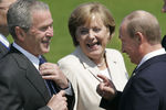 Президент США Джордж Буш, федеральный канцлер Германии Ангела Меркель и президент России Владимир Путин во время саммита G8, 2007 год