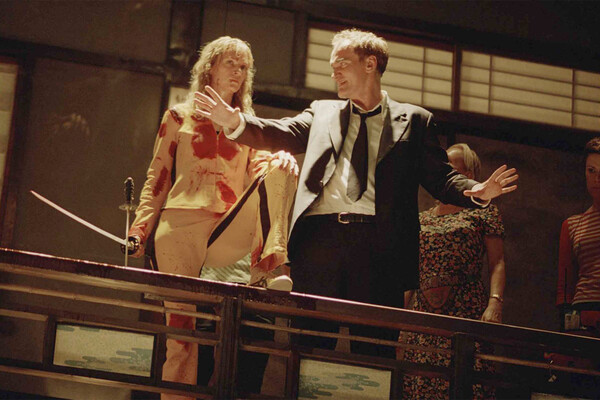 Ума Турман и Квентин Тарантино на съемках фильма «Убить Билла» (2003)