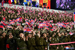 Зрители на военном параде в честь 75-летия Корейской народной армии на площади Ким Ир Сена в Пхеньяне, Северная Корея, 8 февраля 2023 года