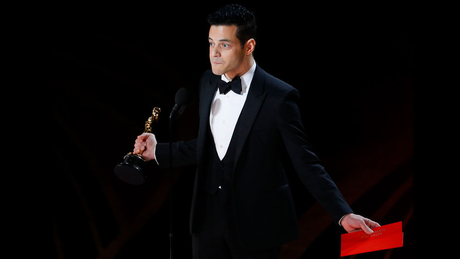 Актер Рами Малек с наградой в категории «Лучший актер первого плана» во время церемонии вручения кинопремии «Оскар» в Лос-Анджелесе, 24 февраля 2019 года 