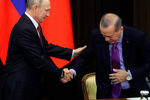 Президент России Владимир Путин и президент Турции Реджеп Тайип Эрдоган во время совместного заявления для прессы по итогам встречи в Сочи, 22 ноября 2017 года