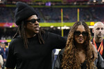 Рэпер Jay-Z с дочерью Блю Айви на Супербоуле в Новом Орлеане, 10 февраля 2025 года 