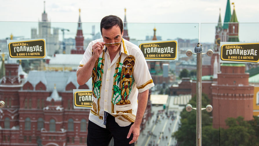 Режиссер Квентин Тарантино во время фотосессии в&nbsp;Москве, 7 августа 2019 года
