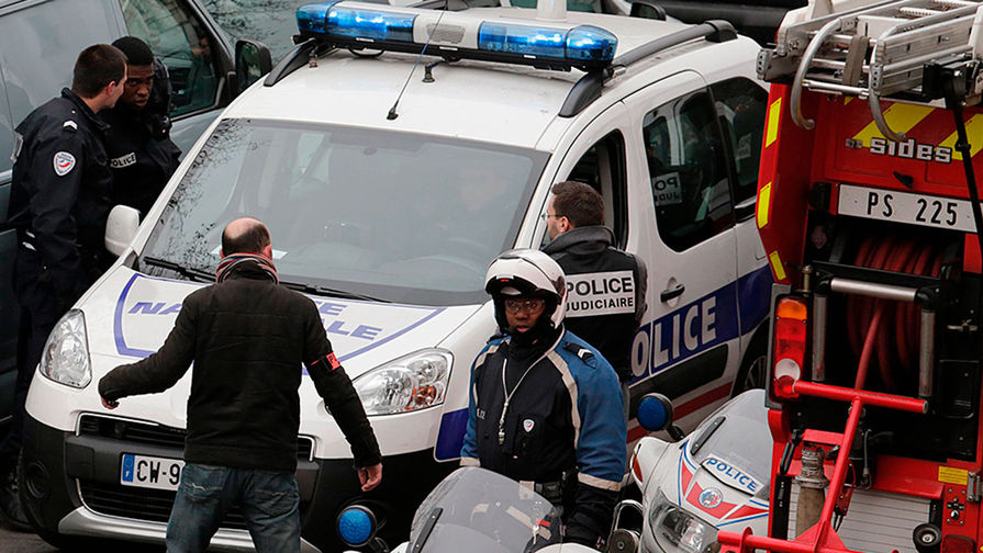 На&nbsp;месте нападения на&nbsp;редакцию журнала Charlie Hebdo в&nbsp;Париже, 7 января 2015 года