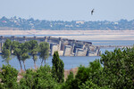 Разрушенная плотина в Новой Каховке Херсонской области, 5 июля 2023 года
