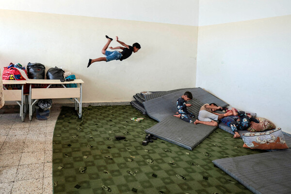 Дети играют в&nbsp;убежище, организованном в&nbsp;школе после разрушительного шторма, вызванного циклоном &laquo;Даниэль&raquo;, Ливия, 20&nbsp;сентября 2023&nbsp;года