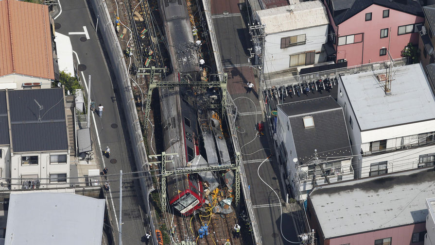 На&nbsp;месте столкновения пассажирского поезда и грузового автомобиля в&nbsp;Иокогаме, 5 сентября 2019 года