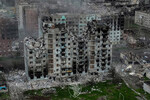 Разрушенные в результате военных действий жилые дома в Артемовске, 21 мая 2023 года