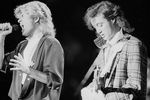Джордж Майкл (слева) выступает в составе группы Wham!, 1985 год