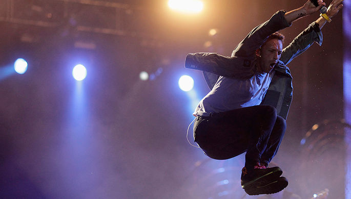 Группа Coldplay выступает на фестивале Rock in Rio в Рио-де-Жанейро, 2011 год
